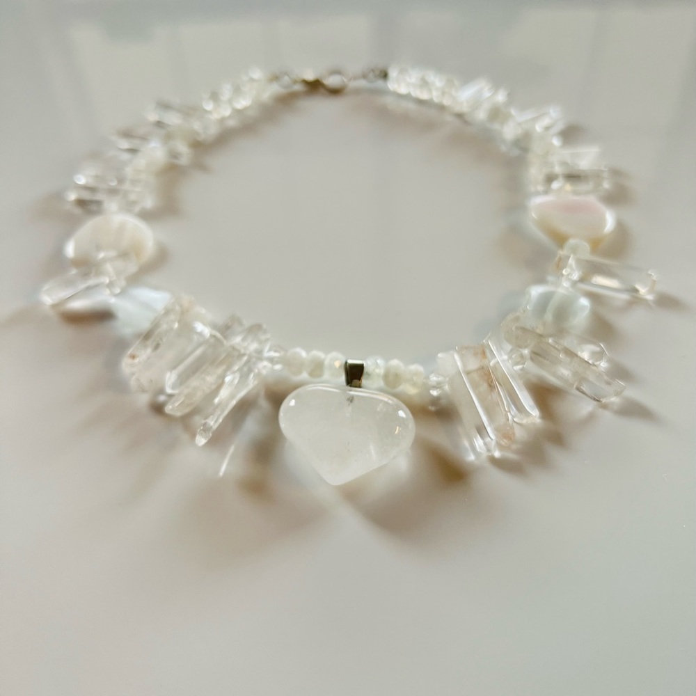 Handmade rock crystal and bead choker with heart-shaped crystal heart.